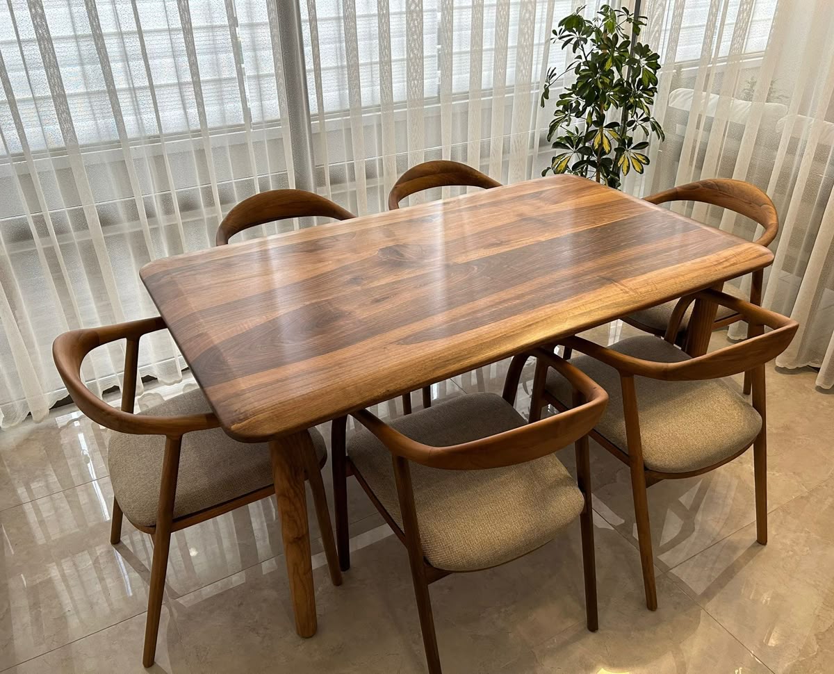6-seater solid sheesham wood dining table by WoodKarigari